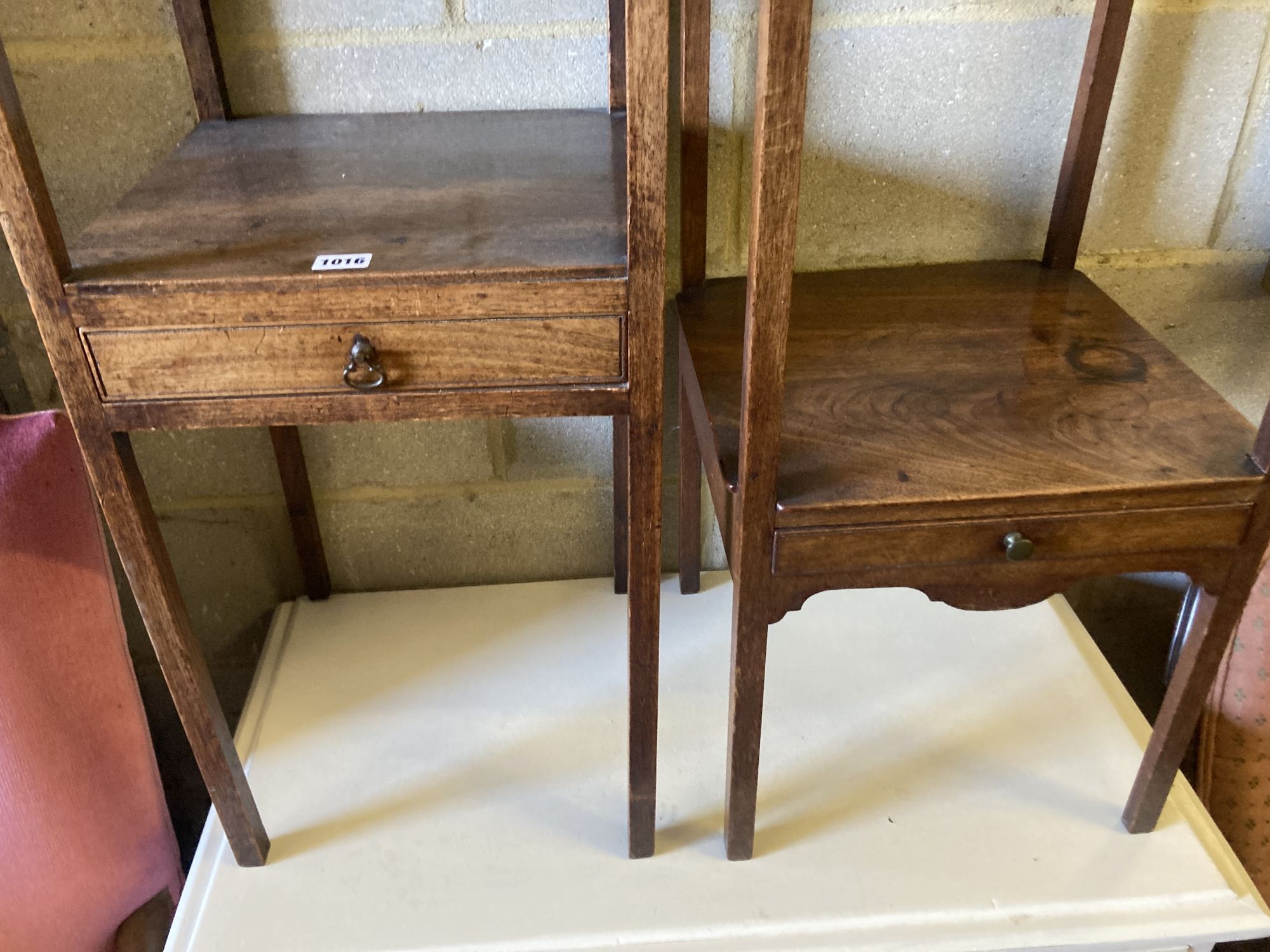 A near pair of George III mahogany washstands, larger width 35cm, depth 35cm, height 79cm
